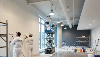 Commercial painting crew in Hoboken, NJ applying durable coatings to a business property